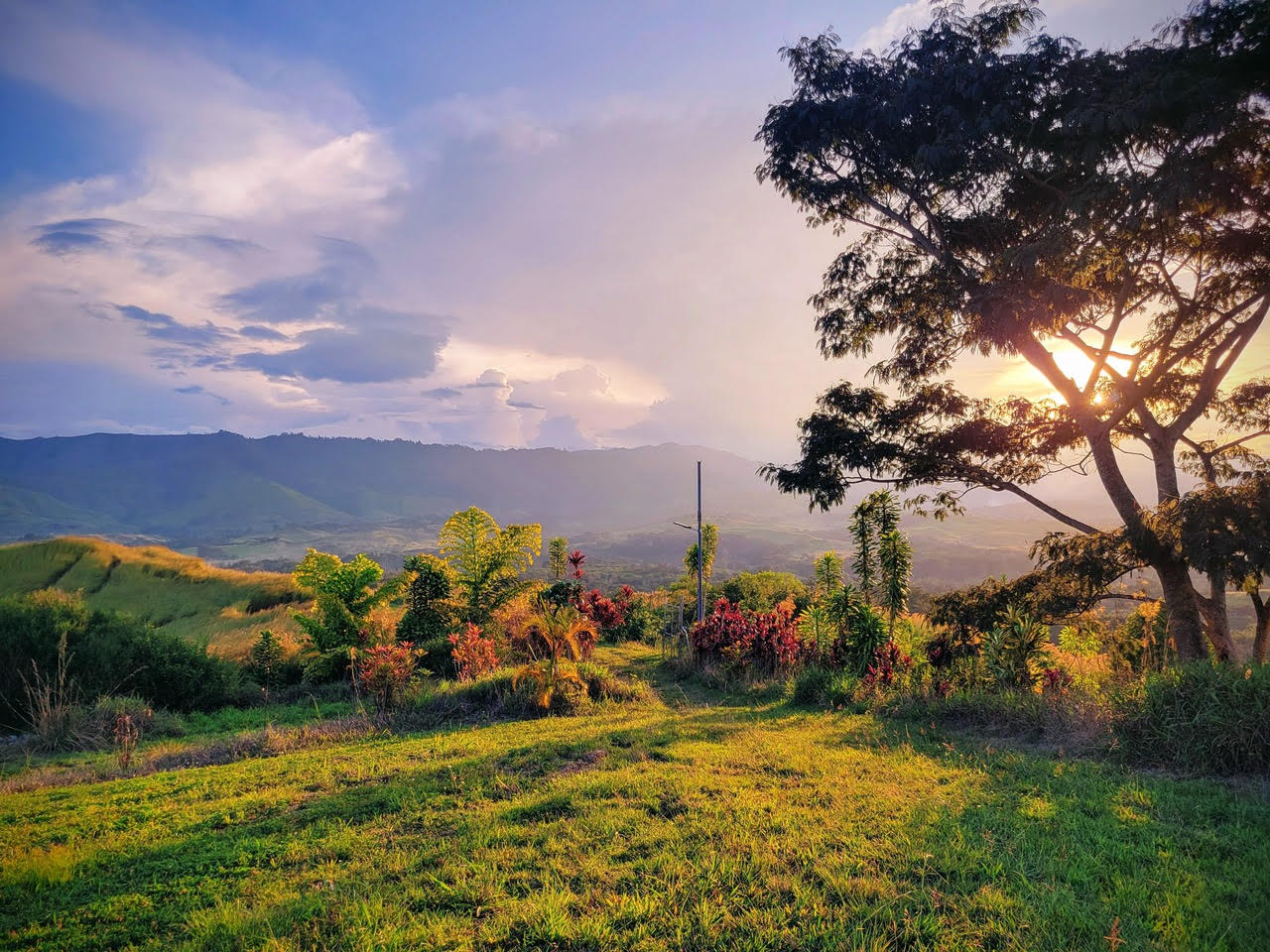 Sunset over the mountains and valleys of Papua New Guinea, where Noah Claasen grew up